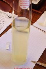 Adding reagent #2 MPS to the reaction bottle for arsenic testing (C) Daniel Friedman at InspectApedia.com