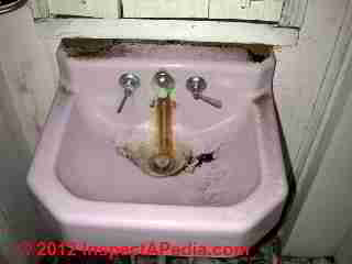 Iron stains on bathroom sink © D Friedman at InspectApedia.com 