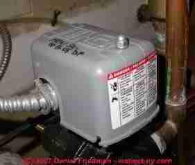 Photograph of a water pump pressure control switch with the cover on